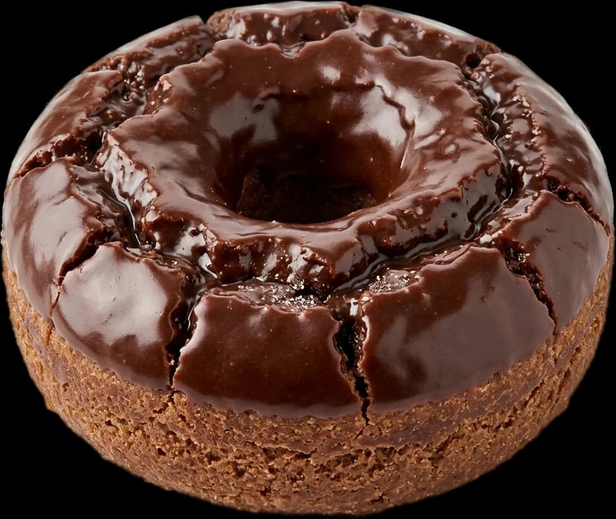 A chocolate-glazed buttermilk cake donut with a cracked top