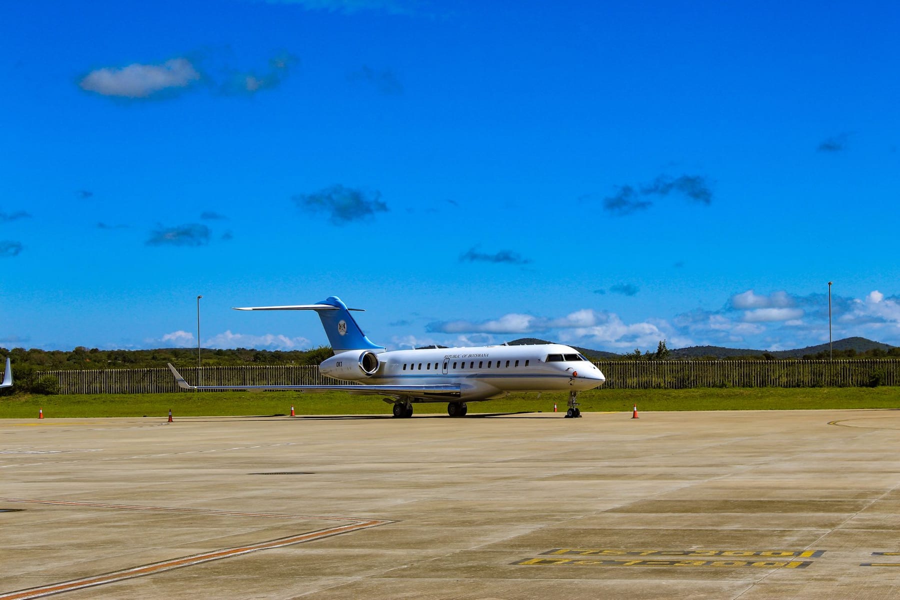 A light jet on the ramp under a blue sky