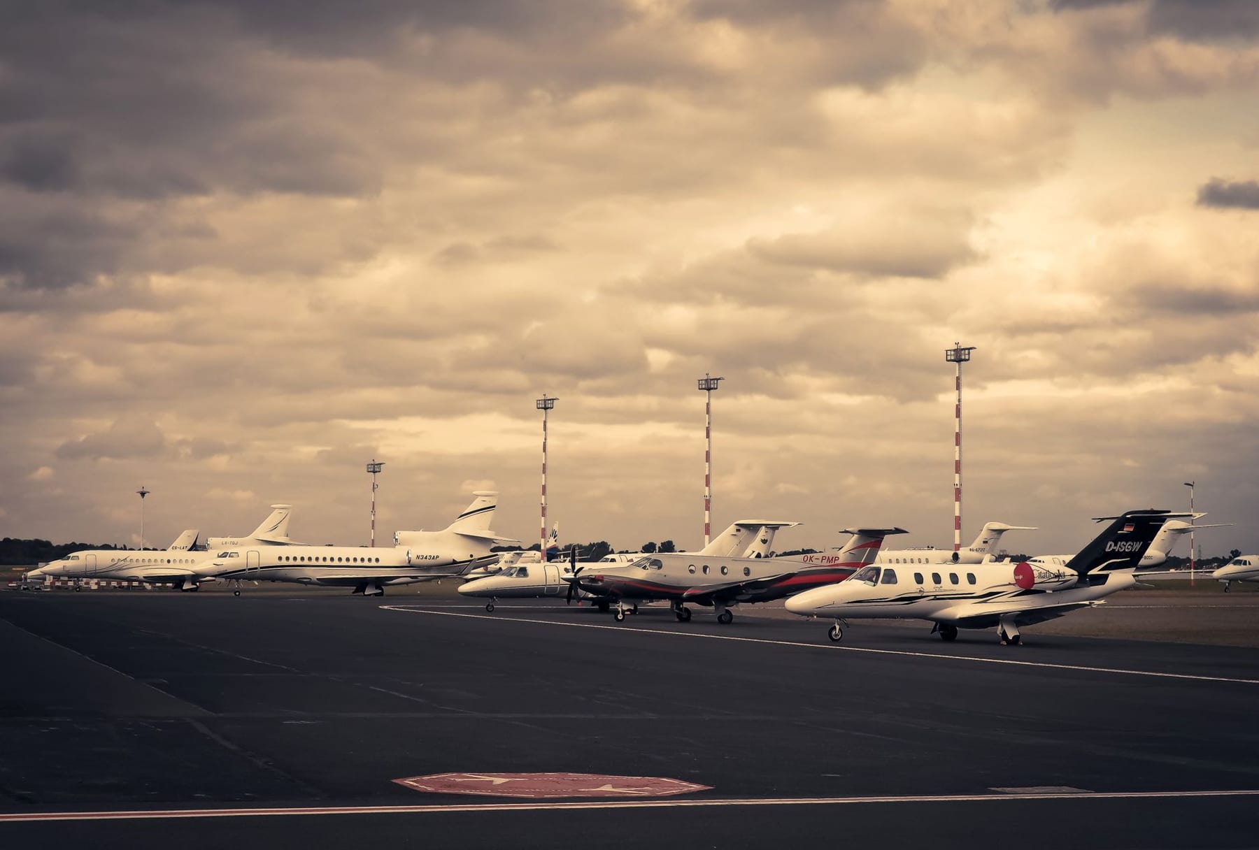A business jet parked on the ramp