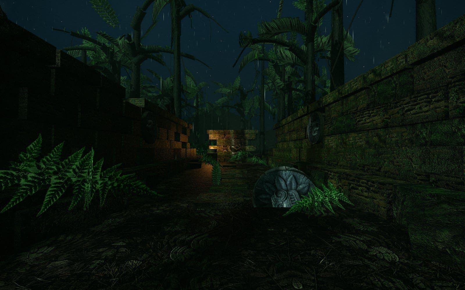 A night view down a narrow stone alley between two long coursed walls, a carved roundel mounted high on each; at the far end a relief of a ruler is lit by a small fire; palm fronds close over the top.
